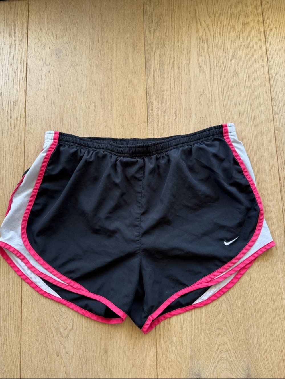 Nike Women’s Black Athletic Shorts with Pink Trim and White Panels